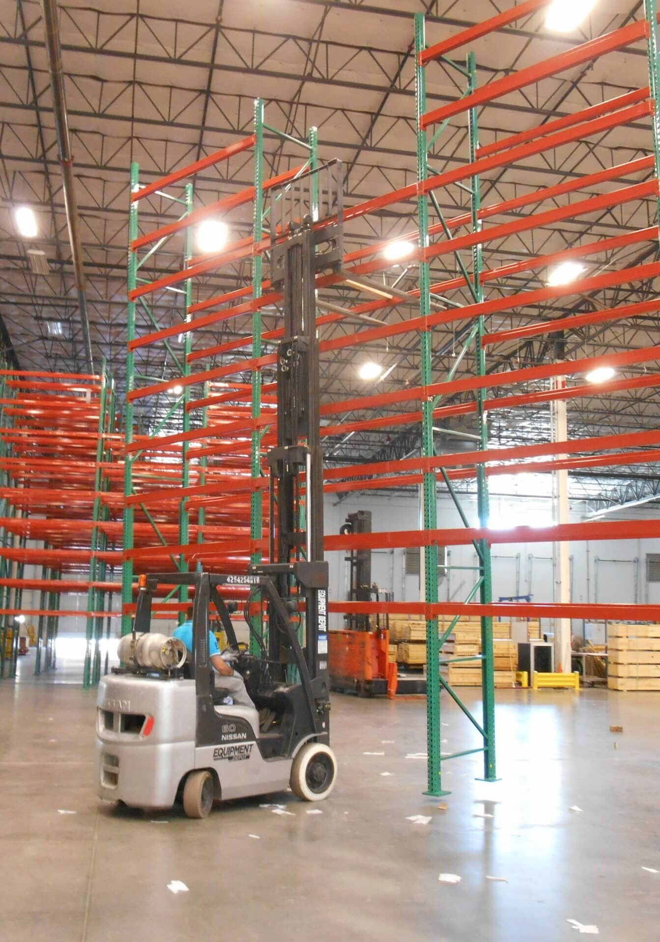 Reseller sorting through pallet contents